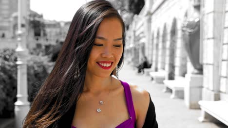 woman in vibrant dress smiling at stadtpark vienna, selective color effect, sunny day