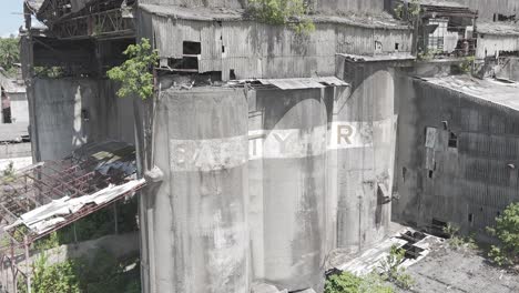 old ruins of abandoned with broken cracked walls and window, pan shot left to right