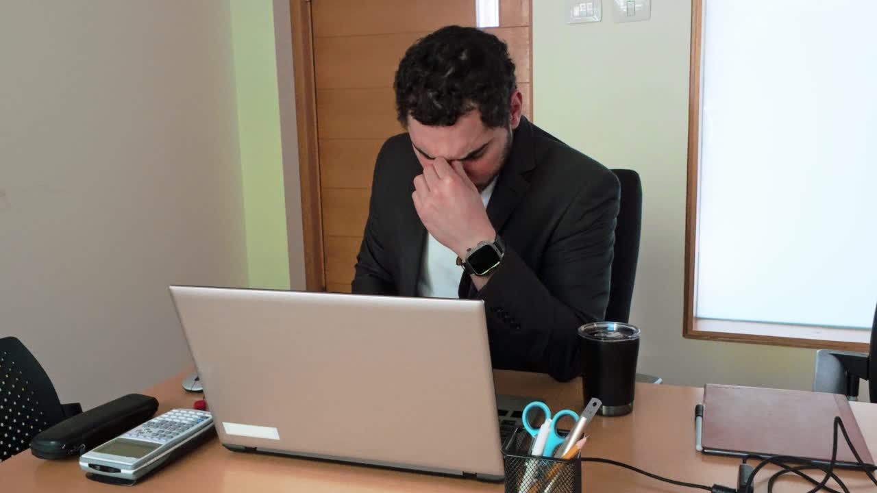 Man Facing Deadline: Office Burnout