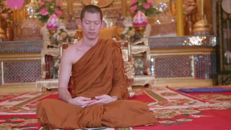 the monks were meditating in the church with calm and beautiful art and buddha images