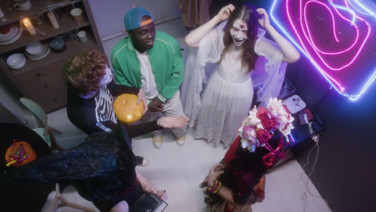 Halloween Party with Friends in Costumes