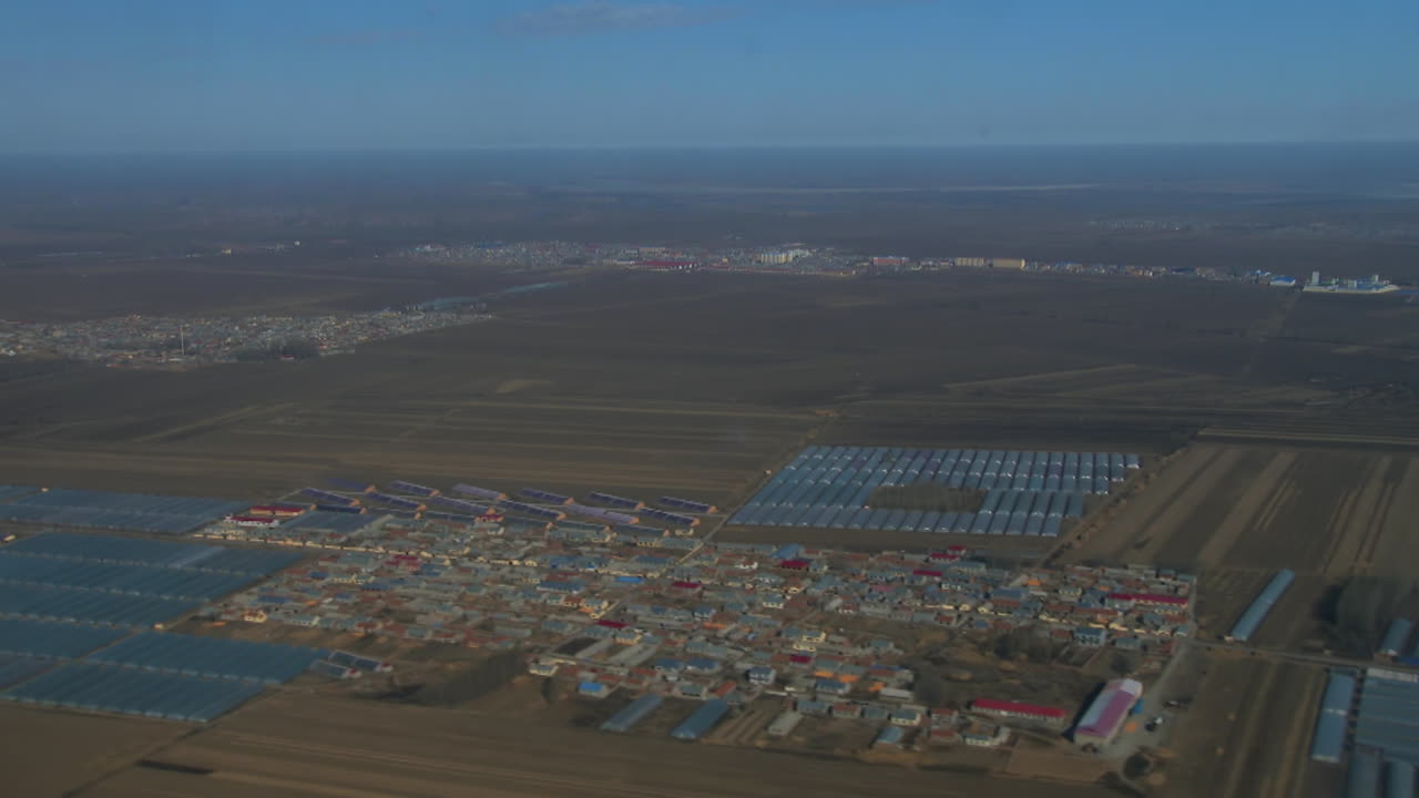 An aerial over rich farmland in rural China 1