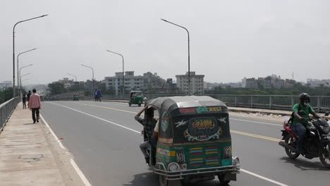 bridge street scene in bangladesh