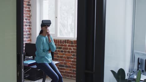 Woman-using-VR-headset-at-office