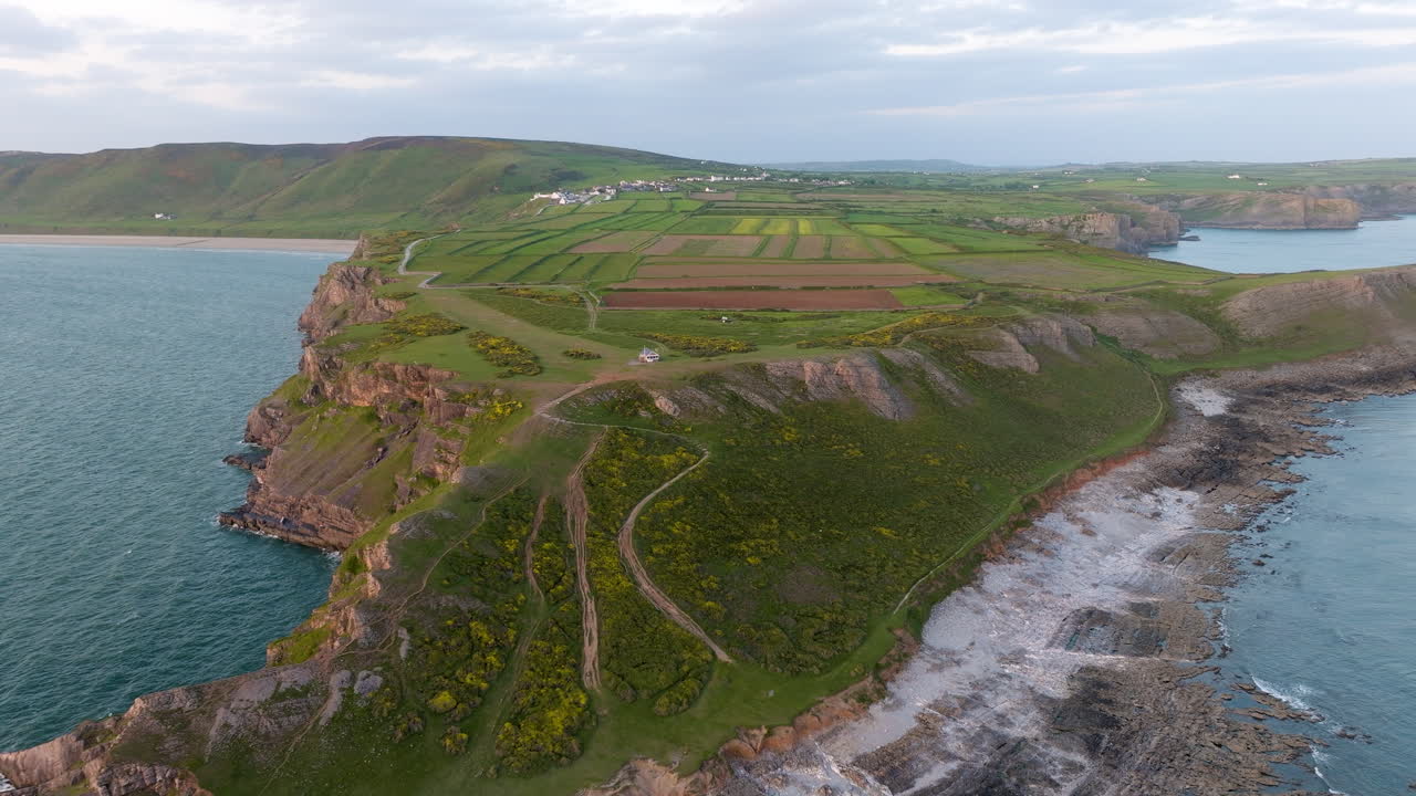 Coastal Cliff Landscape with Village and Farmland