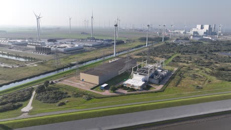 high voltage station infrastructure in the eemshaven, the netherlands. aerial drone view.