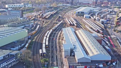 A-train-station-and-depot-shot-from-above-in-Derby,-UK