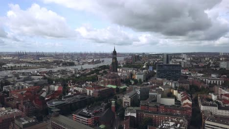 flying towards a church in hamburg city, germany