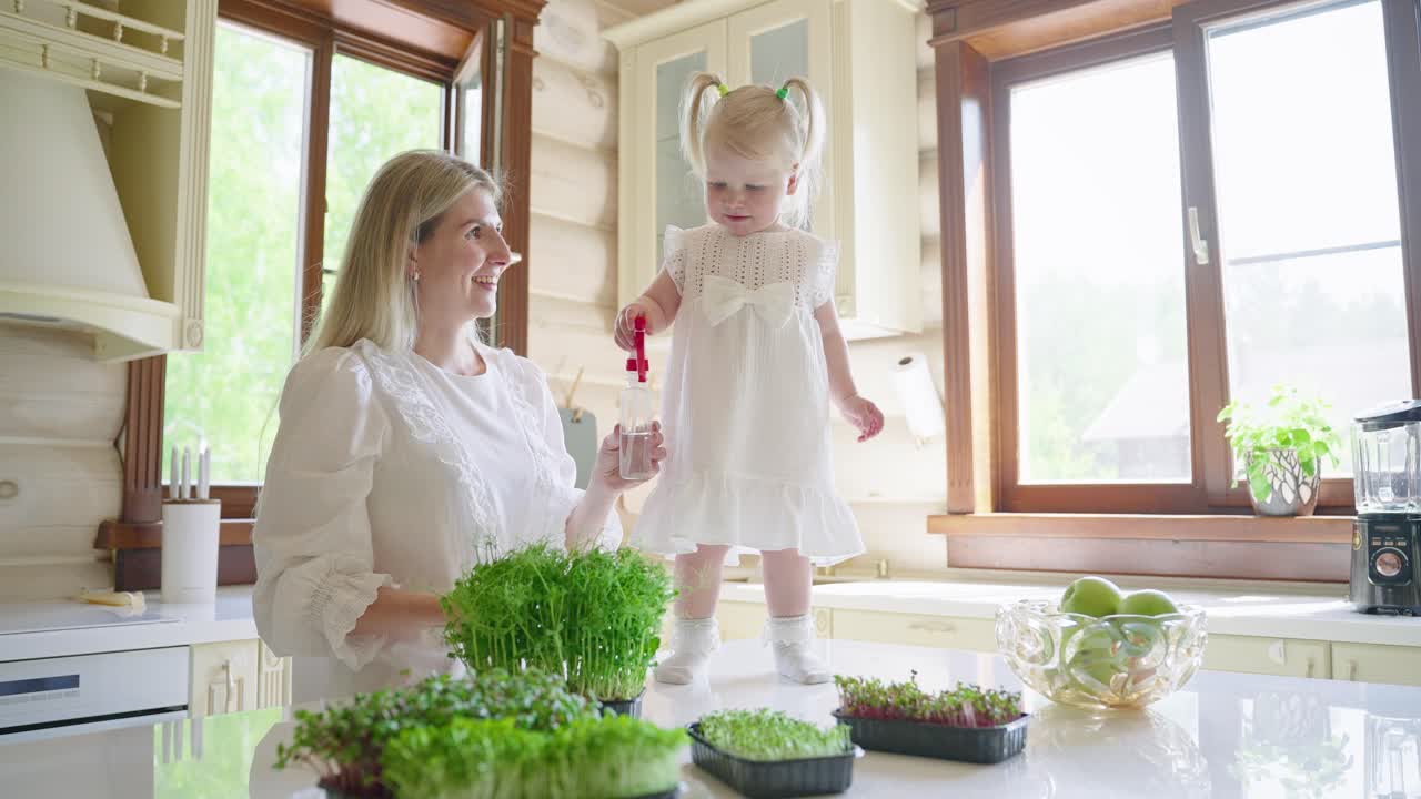 Mother and Daughter Growing Microgreens