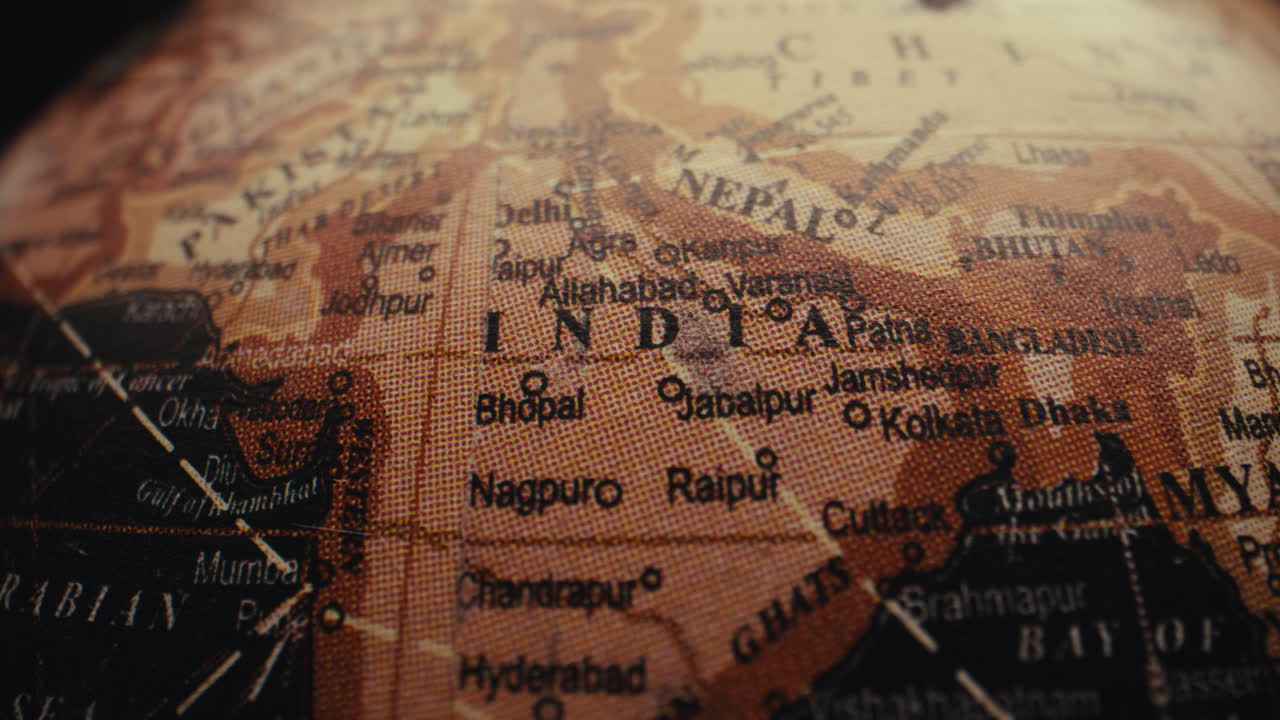 Close-up of an old vintage world globe, focused on India