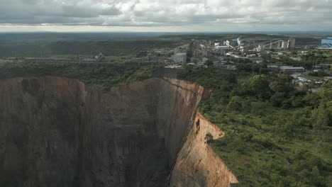 huge steep rock cliffs in big hole of cullinan diamond mine open pit