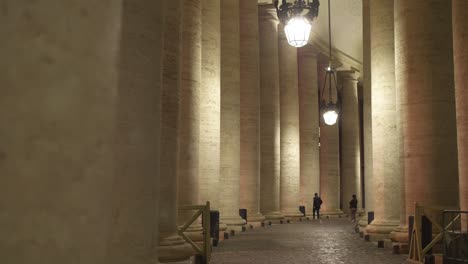 Tourists-Walking-Down-Colonnade