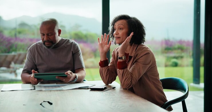 Stressed Business Colleagues Having a Difficult Conversation in an Office
