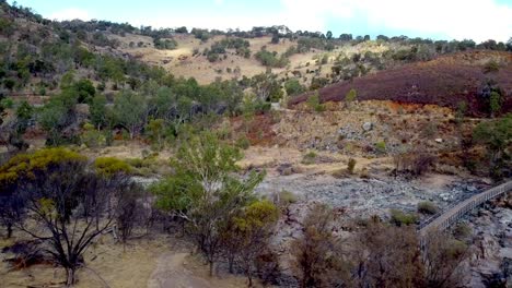 Aerial-reverse-view-near-Bells-Rapids-bridge-with-dry-Swan-River