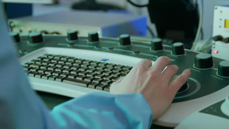 scientist operating laboratory equipment