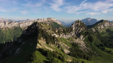 lovely view of green mountains in the alps during a sunny afternoon