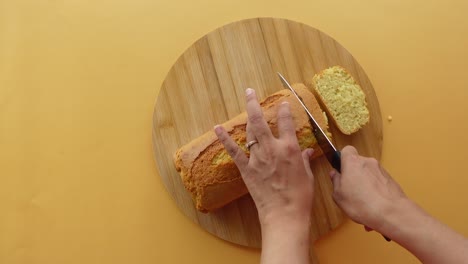 cutting a loaf cake