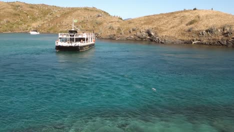 Brazilian-tourist-catamaran-sailing-on-sea-channel-at-Cabo-Frio,-Rio-de-Janeiro-coast