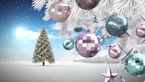 Christmas-bauble-and-star-decorations-hanging-on-christmas-tree-on-winter-landscape-against-blue-sky