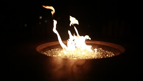 a fire burns at night in 120p super slow motion