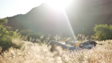 inflated raft in field of black rock canyon campsite, travel concept