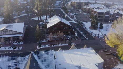 Peaceful-winter-snowfall-on-rooftops-of-calm-outskirt-during-Christmas