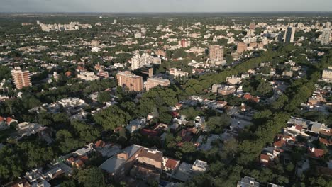 city of mendoza, argentina, aerial drone above green landscape and metropolitan area, great wine capital, enotourism destination, foothill region