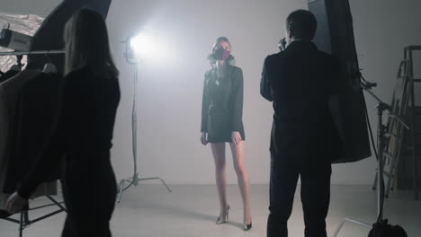 professional photoshoot of model in face mask
