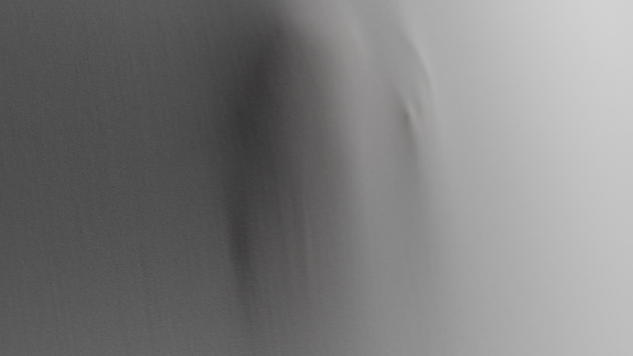 Creepy silhouettes of a woman's hands appears from the white surface