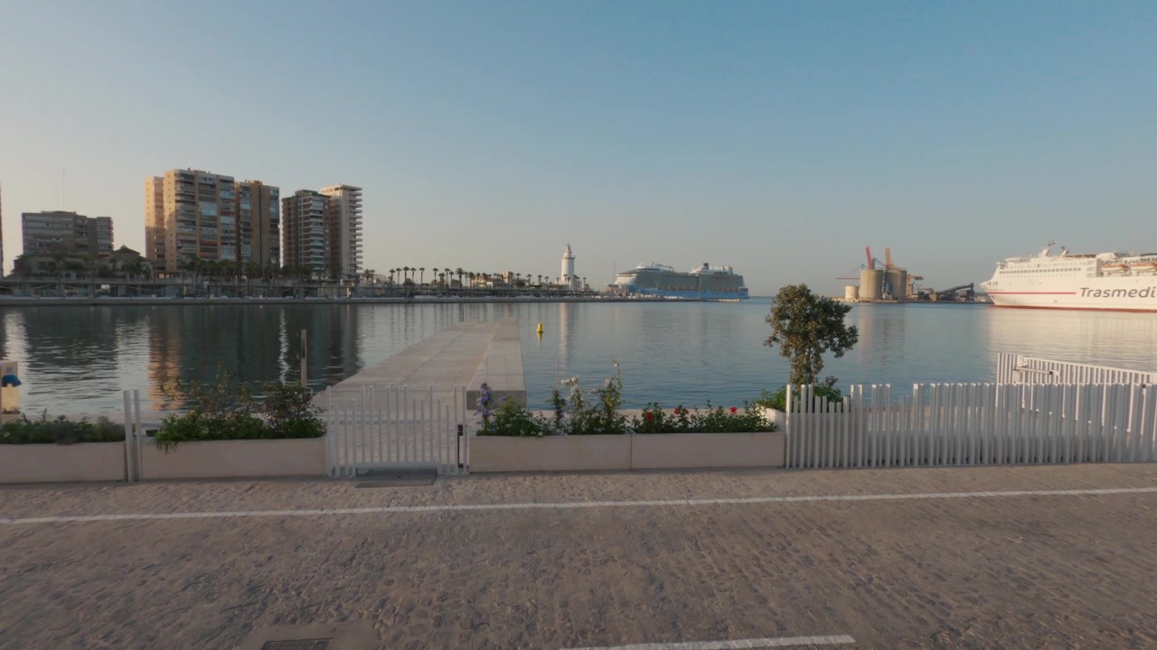 Tranquil port harbor view with pier and cruise ship in Malaga Spain