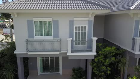 Aerial-Footage-of-White-and-Gray-Modern-Comtemporary-House