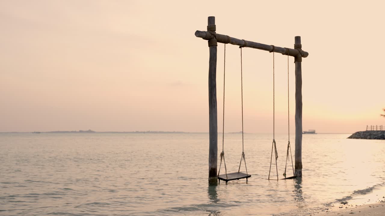 A beach swing with a beautiful, relaxing view of the waves
