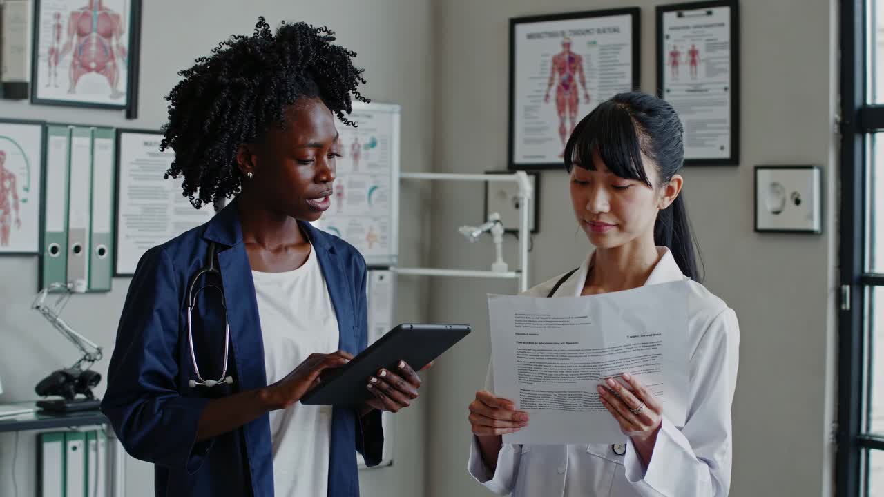 Doctors Reviewing Patient Documents