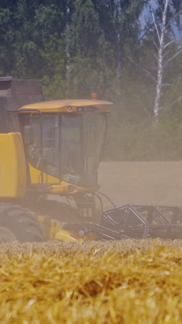 combine working at harvest time. combine harvester during the wheat harvest