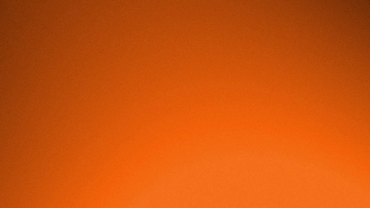 Dynamic Orange Light Leak Transition with Grain Texture