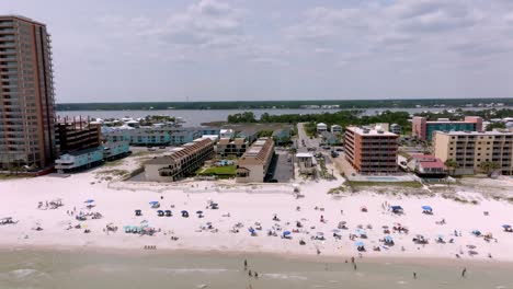 gulf shores, alabama skyline and beach with drone video moving in close