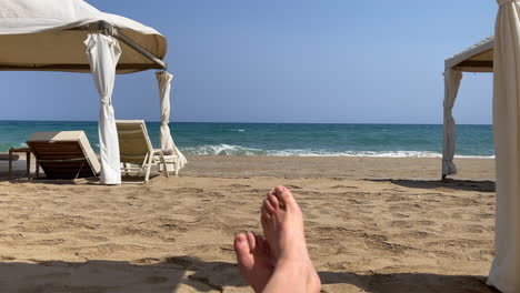 the turquoise sea spills onto the shore of the beach of crete