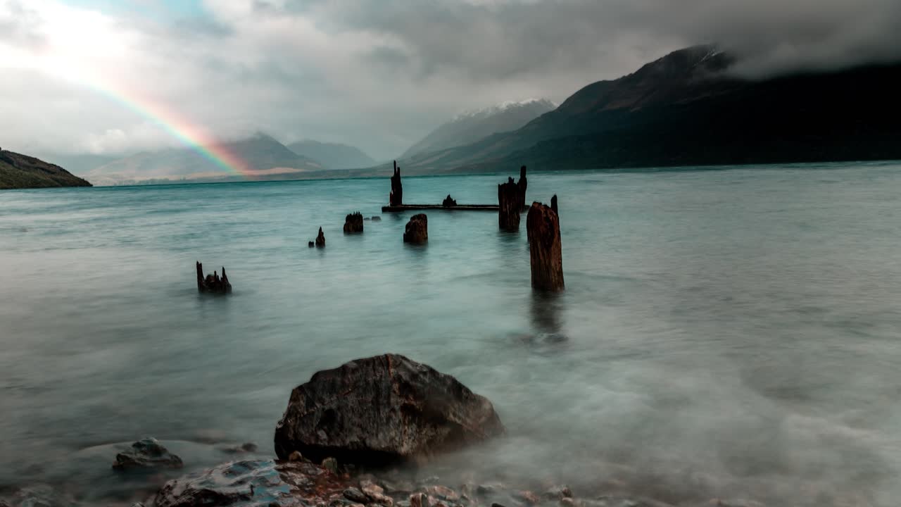 Laka Wakatipu abandoned Jetty Time Lapse with Rainbow