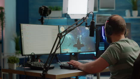 streamer man talking with multiple players into headphones winning