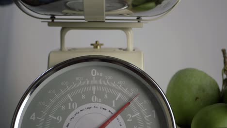 kitchen weighing scales with moving dial medium  shot