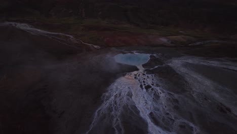 Aerial-orbiting-drone-shot-of-one-of-the-many-active-geyser-in-Iceland