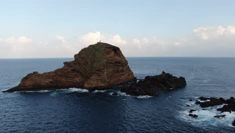 aerial-shot-in-orbit-over-the-islet-called-Ilhéu-Mole-in-the-city-of-Porto-Moniz,-on-the-island-of-Madeira,-Portugal