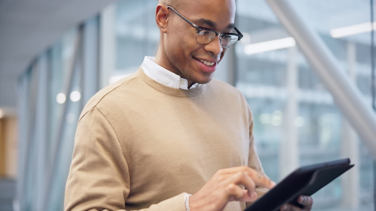 Tablet, walking and black man typing in office