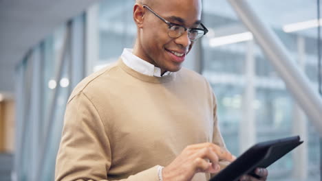 Tablet,-walking-and-black-man-typing-in-office