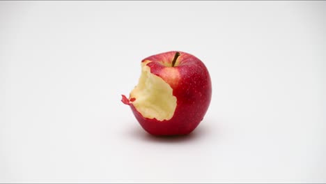 Time-lapse-of-red-apple-that's-getting-bitten