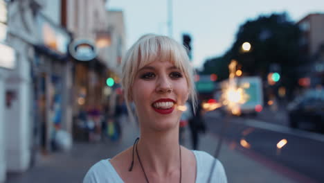 beautiful woman walking with sparkler in the city