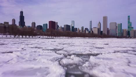 skyline of chicago and lake michigan on winter frosty day. aerial view, usa