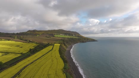 stunning sunrise over rapessed field in greystones01 - 4k cinematic drone footage - wicklow - ireland