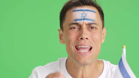 Very nervous man supporting israeli team during a difficult match