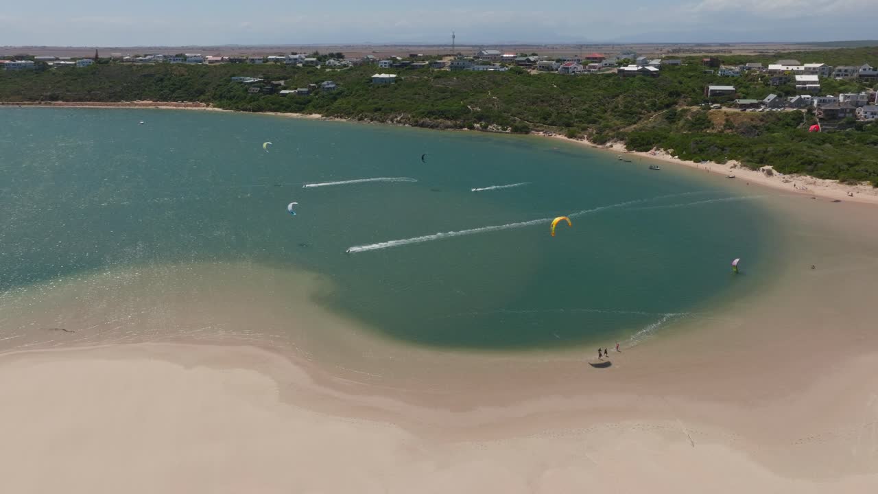 Aerial view of kitesurfing at Witsand beach, South Africa, sunny day